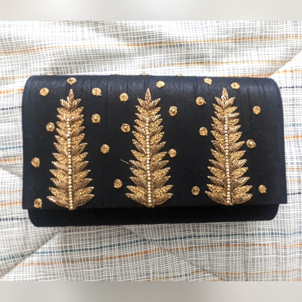 Vintage, hand embroidered clutch in black and gold (never used)